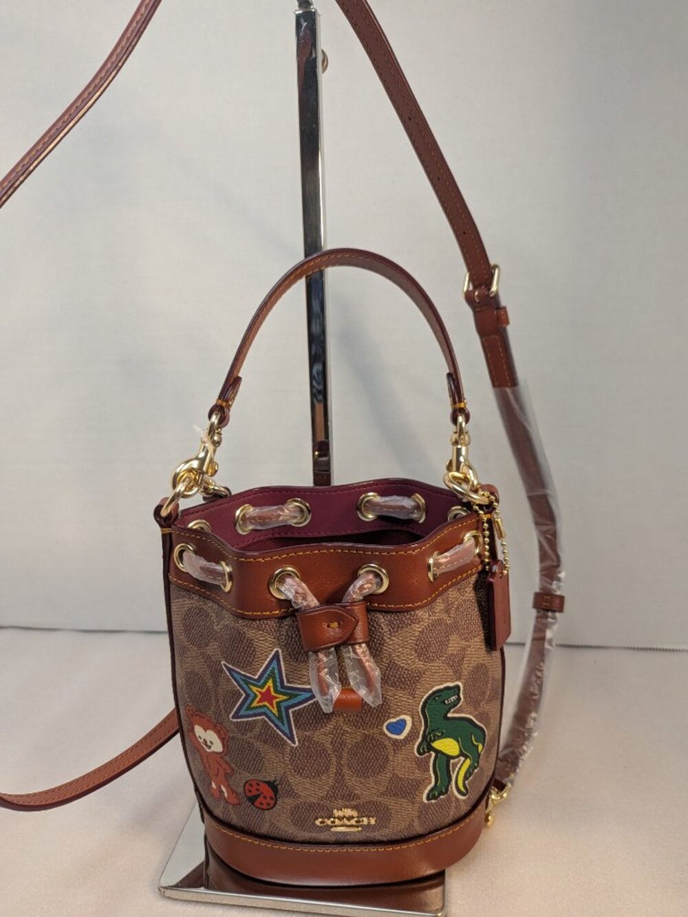 NWT Mini Bucket Bag In Signature Canvas With Sticker Print (CW300) - Picture 7 of 13